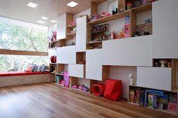Shelving combination as partition in child's bedroom
