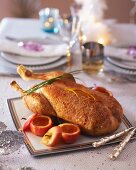 Roast goose with baked apples for Christmas