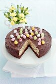 Cheesecake with chocolate chips, chocolate glaze and sugar eggs