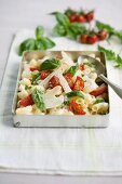 Pasta salad with asparagus, tomatoes and basil