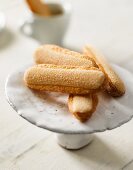 Sponge fingers on a cake stand