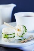 Mini cucumber sandwiches with a cup of tea
