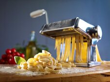 A pasta maker and fresh pasta