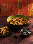 Pumpkin soup with curry, leek, pumpkin seeds and croutons