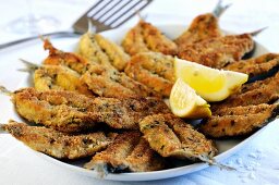 Fried sardines with a herb and Parmesan crust