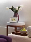 Detail vase of tulips on end table
