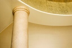 Architectural Detail of Ornate Gold Walls and Columns