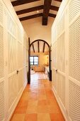 Hallway with closet space on both sides