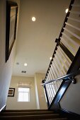 Recessed lights above staircase