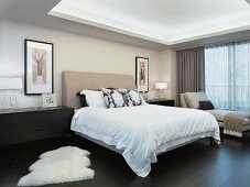 Elegant bedroom with animal skin rug