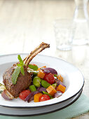 Lamb chops with broad beans and grilled vegetables