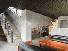 Stone staircase leading to modern sitting area