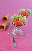 Pistachio and strawberry ice cream with chopped pistachios