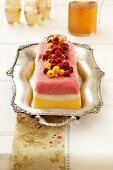 Multi-layer terrine of sorbet on a silver serving platter