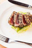 Sesame Encrusted Seared Ahi Tuna in a Spicy Cucumber and Lime Vinaigrette