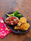 Crunchy Chicken Legs with Broccoli and Sliced Grapes