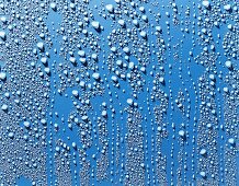 Water droplets on a blue surface