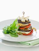 Aubergine and pepper stack with mushrooms and ricotta