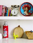 White shelves decorative objects and books (detail)