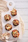 Stuffed giant mushrooms gratinated with mozzarella