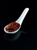 A spoonful of spicy plum chutney