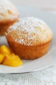 A peach muffin with peach compote