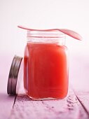 Rhubarb purée in a screw-top jar