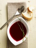 Cream of beetroot soup with bread