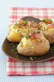 Baked potatoes with garlic puree and pancetta