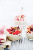 Qunioa pudding with strawberries and pistachios