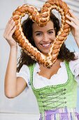 Young Woman With Pretzel Heard