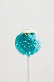 Blue Cake Pop with white sugar pearls and flowers