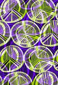 Multi-layered pattern of purple and green peace symbols (print)