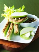 Apple Slices with Peanut Butter and Pumpkin Seeds; Celery with Peanut Butter; Apple Wedges