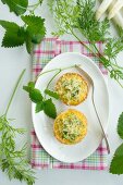 Asparagus muffin with carrot leaves and lemon balm