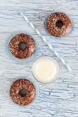 Chocolate doughnuts and a glass of milk