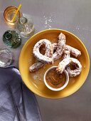 Churros (deep-fried doughnuts, Spain) with a caramel dip