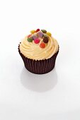 Cupcake with coloured chocolate beans