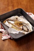 Trout with lemon in parchment paper