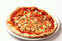 An artichoke, tomato, capers and blue cheese pizza