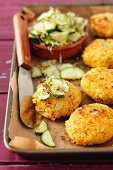 Couscous cakes with a cucumber and bean sprout salad