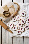 Spiced biscuits decorated with glacé icing and letters