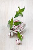 Peppermint bonbons and fresh mint