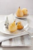Pears poached in white wine, with goat's cheese and honeycomb