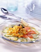 Corn salad on salmon and courgette carpaccio