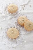 Lemon biscuits decorated with sugar pearls