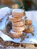 A stack of soft cheese with rosemary