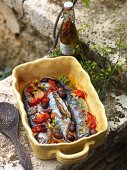 Fried mackerel with tomatoes and olives