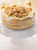 Layered honey cake on a cake stand
