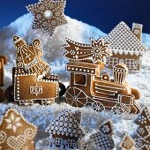 A gingerbread Christmas scene with a steam train